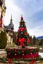 A Christmas tree in front of Peles Castle Royalty Free Stock Photo