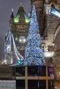 Christmas tree in front of the Tower Bridge in London, UK Royalty Free Stock Photo