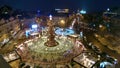 A Christmas tree with garlands illuminates the Christmas fair on Sofiyivska Square in Kyiv, Ukraine