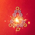 Christmas Tree gears with sparkler on red textured background Royalty Free Stock Photo