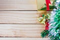 Christmas tree and golden bells with star on the wooden background Royalty Free Stock Photo