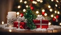 christmas tree and gifts A merry Christmas with a snow covered tree and gifts. The tree is splendid and green