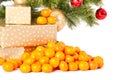 Christmas tree with gifts and presents and mandarines Royalty Free Stock Photo