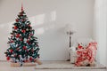 Christmas tree with Christmas gifts in White Hall on Christmas Royalty Free Stock Photo
