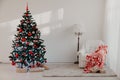 Christmas tree with Christmas gifts in White Hall on Christmas Royalty Free Stock Photo