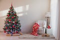 Christmas tree with Christmas gifts in White Hall on Christmas Royalty Free Stock Photo