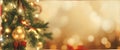 Christmas Tree With gold Baubles close-up against backdrop of golden sparkling Christmas lights. Wide format banner. AI Generated Royalty Free Stock Photo