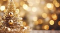 Christmas Tree With gold Baubles close-up against backdrop of golden sparkling Christmas lights. Wide format banner Royalty Free Stock Photo