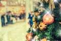 Christmas tree with gold decoration in shopping mall. Royalty Free Stock Photo