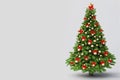 Christmas tree with golden baubles and red ribbon bow Royalty Free Stock Photo