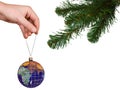 Christmas tree, hand and earth