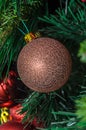 Christmas tree hanging ornament, bronze globe, close up