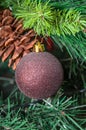 Christmas tree hanging ornament, bronze globe, close up