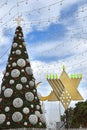 Christmas tree, Hanukkah menorah and crescent in Haifa, Israel