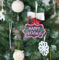 Christmas tree with Happy holidays sign Royalty Free Stock Photo