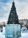 Christmas tree and ice figures on the New Year`s playground, South Ural