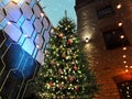 Christmas tree illumination and modern buildings in center in the city,winter holiday ,urban scene Royalty Free Stock Photo