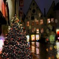 Christmas tree illumination  at night street in Tallinn Old Town Holiday season Royalty Free Stock Photo