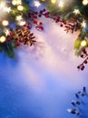 Christmas tree light; blue snow background Royalty Free Stock Photo