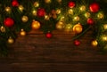 Christmas tree with lights and balls over wood Royalty Free Stock Photo