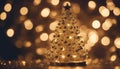 christmas tree with lights A glamorous Christmas with a gold tree and defocused lights. The tree is shiny and luxurious