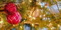 Christmas tree with lights and glittering baubles Royalty Free Stock Photo