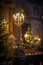 Christmas tree and lights in old church Royalty Free Stock Photo