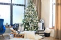 Christmas tree with lights. Christmas Room Interior Design, Xmas Tree Decorated By Lights Presents Gift, Garland Lighting Indoors Royalty Free Stock Photo