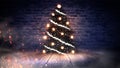 Christmas tree with lights on the wooden floor, lights, lights, lights, glare, smoke. Royalty Free Stock Photo