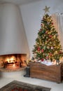 Christmas Tree With Lit Fireplace. Royalty Free Stock Photo