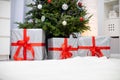 Cristmas gifts under the tree with Christams decorations. Royalty Free Stock Photo