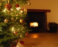 Christmas Tree and log fire Royalty Free Stock Photo