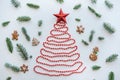 A Christmas tree made of beads and a star on top. Celebratory concept. Royalty Free Stock Photo