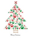 Christmas tree made of bone and paw prints. New year greeting card