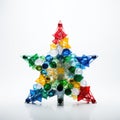 Christmas tree made of colorful plastic pieces on white background Royalty Free Stock Photo