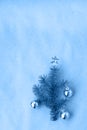 Christmas tree made of fir branches and silver decorations in classic blue trendy color of the year 2020 Royalty Free Stock Photo