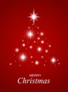 Christmas Tree made, glitter bokeh lights and sparkles. Shining star, sun particles and sparks with lens flare effect on Royalty Free Stock Photo