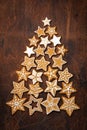 Christmas tree made from homemade gingerbread cookies, old wooden table Royalty Free Stock Photo