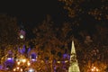 Christmas tree made with luminous LEDs at night next to the historical building of the city hall of Valencia, Spain. Royalty Free Stock Photo