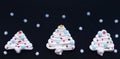 Christmas tree made by meringue with white snowflackes Royalty Free Stock Photo
