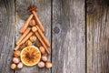 Christmas tree made of nuts, spices and dried oranges. Viewed from above Royalty Free Stock Photo