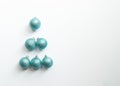 Christmas tree made out of blue balls over light grey background, Christmas and new year background, copy space Royalty Free Stock Photo