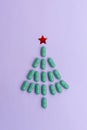 Christmas tree made of pills for Christmas, conceptual background on the New Year theme for medicine Royalty Free Stock Photo