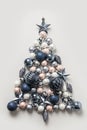 Christmas tree made of pink and blue balls on grey. Xmas. Flat lay, top view. Holiday Greeting card. Happy New Year. Royalty Free Stock Photo