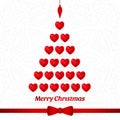 Christmas tree made of red hearts. Red bow, ribbon. Merry Christmas, New Year.