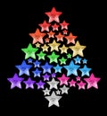 Christmas tree made of shiny stars black background isolated close up, colorful stars in shape of decorative New Year pine Royalty Free Stock Photo