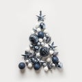 Christmas tree made of stars, blue balls on grey background. Xmas composition. Flat lay, top view. Holiday Greeting card. Happy Royalty Free Stock Photo