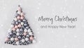 Christmas tree made of shiny silver balls on grey background. Happy New Year Royalty Free Stock Photo