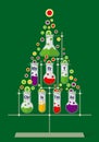Christmas tree made of test tubes and bubbles on dark green background