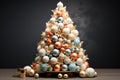 Christmas tree made of white, blue and orange ball toys Royalty Free Stock Photo